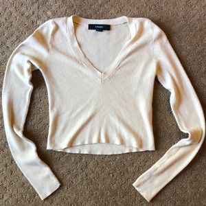 Pale yellow long sleeve top